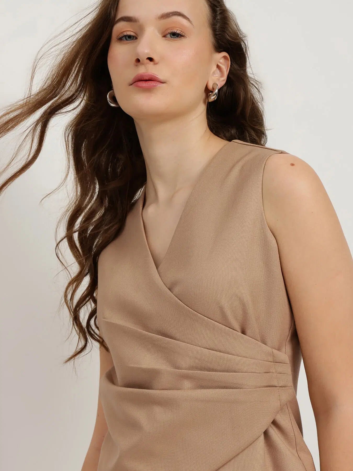 Beige Pleated Waistcoat Top for Women with Elegant Sleeveless Fit